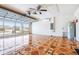 Spacious garage featuring a decorative tile floor, natural light, and garage door at 404 Rio Grande Ct, Poinciana, FL 34759