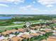 Panoramic aerial view of the community with beautiful lakes, lush golf course, and landscaping at 4148 Dunmore Dr, Lake Wales, FL 33859
