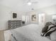 Spacious bedroom offers ample natural light, stylish furniture, and a cozy ambiance at 4148 Dunmore Dr, Lake Wales, FL 33859