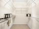 Walk-in closet with wire shelving, providing ample storage space and organization at 4148 Dunmore Dr, Lake Wales, FL 33859