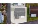 Birds eye view showing a home with stone landscaping, dark roof, and white trim at 4228 Nandina St, Lake Wales, FL 33898
