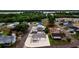 Aerial view of the property with lush green landscape and neighborhood homes near the lake at 4228 Nandina St, Lake Wales, FL 33898