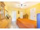 Bedroom offering ample storage space, ceiling fan, and closet doors for convenience at 4228 Nandina St, Lake Wales, FL 33898