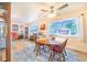 Inviting dining area with natural light, wooden table, and view to the living room at 4228 Nandina St, Lake Wales, FL 33898