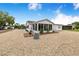 Charming single-story home with an expansive gravel yard and well-maintained landscaping at 4228 Nandina St, Lake Wales, FL 33898