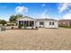Well-maintained home featuring a screen room, extra shed, and minimal, low-maintenance landscaping at 4228 Nandina St, Lake Wales, FL 33898