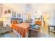 This main bedroom features plenty of natural light, wood floors and an ensuite bathroom at 4228 Nandina St, Lake Wales, FL 33898