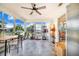 Inviting porch with tile flooring, ceiling fan, and plenty of natural light from numerous windows at 4228 Nandina St, Lake Wales, FL 33898