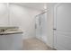 The bathroom features a granite topped vanity, a glass-enclosed shower, and tiled floors at 4333 Pumice Dr, Lakeland, FL 33811