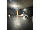 Spacious garage featuring finished walls and a functional layout at 4333 Pumice Dr, Lakeland, FL 33811