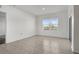 Bright, tiled living room offers natural light from the window, enhancing the spacious feel at 4333 Pumice Dr, Lakeland, FL 33811