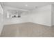 Open floor plan with expansive mirrors for visual space, seamlessly integrating the kitchen and dining areas at 4333 Pumice Dr, Lakeland, FL 33811