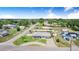 Expansive aerial view of the neighborhood showcasing the location near a lake at 498 W 7Th St, Frostproof, FL 33843