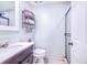 Traditional bathroom with a sink, toilet, standup shower and towel rack at 498 W 7Th St, Frostproof, FL 33843