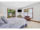 Inviting bedroom with large windows offering bright, scenic views, creating a serene and relaxing retreat at 553 Thornburg Rd, Babson Park, FL 33827