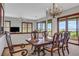 Elegant dining room featuring hardwood floors and water views, perfect for entertaining guests at 553 Thornburg Rd, Babson Park, FL 33827