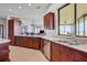 Spacious kitchen with stainless steel appliances, blending style and functionality for culinary enthusiasts at 553 Thornburg Rd, Babson Park, FL 33827
