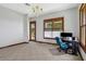 Bright and airy office with natural light from large windows, ample workspace, and a cozy atmosphere for productivity at 553 Thornburg Rd, Babson Park, FL 33827