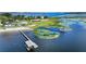 Waterfront home with boat dock and lift, offering access to open water for boating and recreation at 553 Thornburg Rd, Babson Park, FL 33827