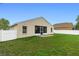 Wide backyard with a view of the house at 59 Saint Kitts Cir, Winter Haven, FL 33884