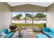 Enclosed porch with furniture and a view of backyard at 59 Saint Kitts Cir, Winter Haven, FL 33884