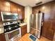 Kitchen featuring stainless steel appliances and ample cabinet space at 605 Wanamaker Ave, Fort Meade, FL 33841