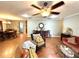 An open living room with views to dining area, stylish furnishings, and lots of space at 605 Wanamaker Ave, Fort Meade, FL 33841