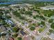 Aerial view of neighborhood with single-Gathering homes and greenery at 608 William Ave, Winter Haven, FL 33880