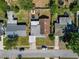 An aerial view shows the property's layout, showcasing the backyard with play equipment and proximity to neighboring homes at 608 William Ave, Winter Haven, FL 33880