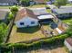 Aerial view of backyard with trampoline and shed surrounded by a wood fence at 608 William Ave, Winter Haven, FL 33880