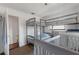 bedroom featuring a bunkbed, crib, and changing table in a well-lit space at 608 William Ave, Winter Haven, FL 33880
