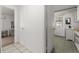Hallway featuring access to the kitchen and living area at 608 William Ave, Winter Haven, FL 33880