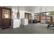 View of screened patio with laundry area and outdoor seating at 608 William Ave, Winter Haven, FL 33880