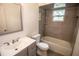 Bright bathroom with modern vanity and tiled shower and bathtub at 612 Muskrat Dr, Kissimmee, FL 34759