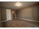 Bedroom features updated floors and recessed lighting, offering a simple and modern space at 612 Muskrat Dr, Kissimmee, FL 34759