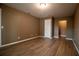 Bedroom featuring hard surface floors, a white door, and recessed lighting at 612 Muskrat Dr, Kissimmee, FL 34759