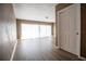 Spacious living room featuring modern flooring, neutral walls, and ample natural light at 612 Muskrat Dr, Kissimmee, FL 34759
