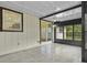 Lanai with tile flooring, ceiling fan, and view of the yard at 6320 Newman E Cir, Lakeland, FL 33811