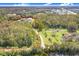 Aerial view of the property with red lot line, highlighting the expansive land at 6344 Old Lake Wilson Rd, Davenport, FL 33896