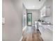 The laundry room has lots of counter space and storage at 6344 Old Lake Wilson Rd, Davenport, FL 33896