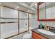 Bathroom featuring a glass-enclosed shower and updated fixtures at 6925 Alturas Babson Park Cutoff, Bartow, FL 33830