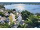Scenic lakefront homes featuring easy access to lake, mature trees, and convenient roads at 711 Lake Dexter Cir, Winter Haven, FL 33884