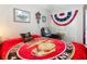 Bright bedroom featuring themed decor, ample closet space, and natural light at 711 Lake Dexter Cir, Winter Haven, FL 33884
