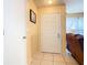 Inviting entryway featuring neutral tones, tiled flooring, and a closet at 711 Lake Dexter Cir, Winter Haven, FL 33884