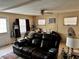 Cozy living room with lots of natural light, featuring comfortable seating, and tile floors at 730 Druid St, Lakeland, FL 33805