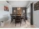 Elegant dining room with a large table, seating for six, and stylish decor at 8001 Arrow Creek Rd, Kissimmee, FL 34747