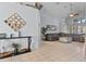 Spacious living area with tile floors, stylish decor, and comfortable seating, perfect for relaxing at 8001 Arrow Creek Rd, Kissimmee, FL 34747