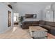 Inviting living room with tile flooring, offering ample space and a cozy seating arrangement at 8001 Arrow Creek Rd, Kissimmee, FL 34747