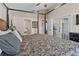 Spacious main bedroom with ample natural light and access to the bathroom adds to the home's appeal at 8001 Arrow Creek Rd, Kissimmee, FL 34747