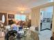 Open concept with an adjacent kitchen view at 9430 Daney St, Gotha, FL 34734